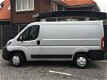 Peugeot Boxer - GB 330 L1H1 BlueHDi 130PK Premium Pack Airco, Cruise control, Camera, Voorraad Voord - 1 - Thumbnail