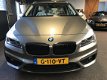 BMW 2-serie Active Tourer - 218i High Executive *NAVIGATIE*LEDER*CRUISE-CONTROL - 1 - Thumbnail