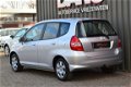 Honda Jazz - 1.4 Style 2006 Grijs Clima/Cruise/98.739 km - 1 - Thumbnail