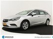 Opel Astra Sports Tourer - 150 pk Online Edition Automaat Navigatie / Cruise control / Parkeersensor - 1 - Thumbnail