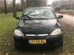 Opel Corsa - 1.2-16V Silverline airco nieuweapk 2006 rijdt super zuinig - 1 - Thumbnail