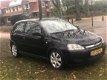 Opel Corsa - 1.2-16V Silverline airco nieuweapk 2006 rijdt super zuinig - 1 - Thumbnail