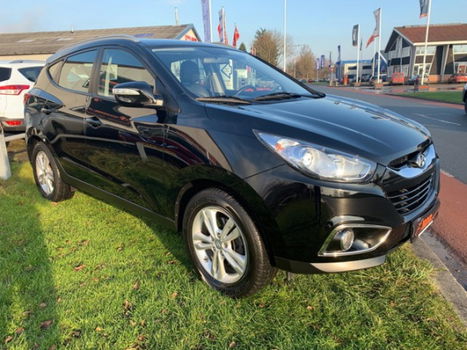 Hyundai ix35 - 2.0i Dynamic Automaat / 17''LMV / Stoelverwarming - 1