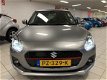 Suzuki Swift - 1.0 Stijl Smart Hybr - 1 - Thumbnail