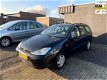 Ford Focus Wagon - 1.4-16V Centennial 2de eigenaar airco nieuwe apk - 1 - Thumbnail