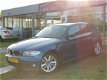 BMW 1-serie - 116i High Executive Airco/El.ramen/PDC/Navi/APK - 1 - Thumbnail