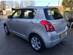 Suzuki Swift - 1.3 Shogun * 59.516 km + NAP / 5 deurs / Airco - 1 - Thumbnail