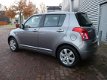 Suzuki Swift - 1.3 Exclusive 2009 Airco/2 jaar APK/5-deurs/Grijs - 1 - Thumbnail