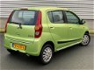 Daihatsu Cuore - 1.0 Premium 1420km - N.A.P - stuurbekrachtiging - 5Drs - 1 - Thumbnail