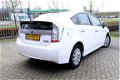 Toyota Prius - 1.8 Plug-in Aspiration Aut. 5-Deurs Clima/Stoelverw./LMV/A-Cam - 1 - Thumbnail