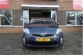 Toyota Prius - 1.8 Dynamic | Hybride / Camera / Navi / HUD - 1 - Thumbnail