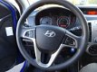 Hyundai i20 - 1.4i DynamicVersion Airco, elektrische ramen en centrale vergrendeling - 1 - Thumbnail