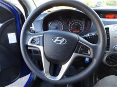 Hyundai i20 - 1.4i DynamicVersion Airco, elektrische ramen en centrale vergrendeling