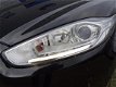Ford Fiesta - Titanium 100PK | Navi | Cruise | 1e eigenaar | 5drs - 1 - Thumbnail