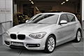 BMW 1-serie - 116i Sportline Autm Navi Xenon Schuifdak elektr / memory stoelen - 1 - Thumbnail