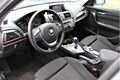 BMW 1-serie - 116i Sportline Autm Navi Xenon Schuifdak elektr / memory stoelen - 1 - Thumbnail