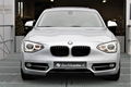 BMW 1-serie - 116i Sportline Autm Navi Xenon Schuifdak elektr / memory stoelen - 1 - Thumbnail