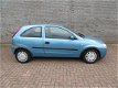 Opel Corsa - 1.0-12V Comfort - 1 - Thumbnail