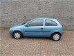 Opel Corsa - 1.0-12V Comfort - 1 - Thumbnail