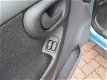 Opel Corsa - 1.0-12V Comfort - 1 - Thumbnail