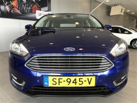 Ford Focus - 125pk Titanium Park Assist, Navigatie, Voorruit verwarming - 1