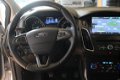 Ford Focus Wagon - 1.0 EcoBoost Titanium 125pk 6-bak FULL OPTIONS BLIS, HALF LEDER, TREKHAAK, ETC. E - 1 - Thumbnail