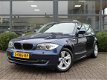 BMW 1-serie - 116i Business Line*Xenon*Unieke kleur*Parkeersensoren V+A*130.000KM - 1 - Thumbnail