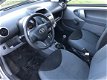 Toyota Aygo - 1.0 12V VVT-I 3DRS Plus | Airco, 2e eigenaar, Centrale vergrendeling - 1 - Thumbnail