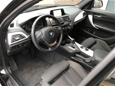 BMW 1-serie - 118i Centennial Executive AUT. LED, Navi, Sportstoelen, dealeronderhouden, 1e eig