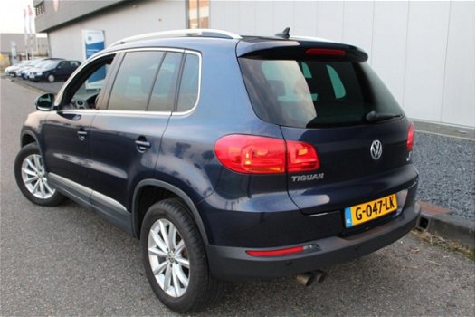 Volkswagen Tiguan - 1.4 TSI Sport&Style Stoelverwarming Zwarte Hemel Navigatie Achteruitrijcamera - 1