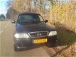 SsangYong Musso - 2.9 TDL hoog Airco grijs kenteken apk 08-2020 - 1 - Thumbnail