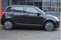 Suzuki Swift - 1.3 Comfort - 1 - Thumbnail