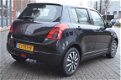 Suzuki Swift - 1.3 Comfort - 1 - Thumbnail