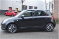 Suzuki Swift - 1.3 Comfort - 1 - Thumbnail