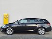 Opel Astra Sports Tourer - 1.4 Turbo Cosmo 120 pk Navigatie / AGR comfortstoelen / Parkeersensoren / - 1 - Thumbnail