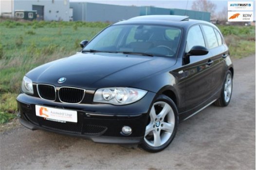 BMW 1-serie - 118i AUTOMAAT / NAVI / DAKRAAM / LMV / PDC / DEALER /VOL - 1