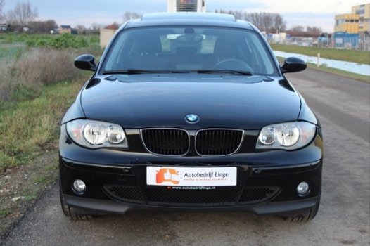 BMW 1-serie - 118i AUTOMAAT / NAVI / DAKRAAM / LMV / PDC / DEALER /VOL - 1