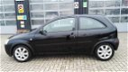 Opel Corsa - 1.2-16V Com goed onderhouden auto - 1 - Thumbnail