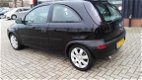 Opel Corsa - 1.2-16V Com goed onderhouden auto - 1 - Thumbnail