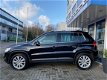 Volkswagen Tiguan - 1.4 TSI SportenStyle I Leder I Navigatie I PDC I Stoelverwarming - 1 - Thumbnail