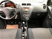 Daihatsu Cuore - 1.0 Comfort Airco - 1 - Thumbnail