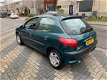 Peugeot 206 - 1.4 Gentry / nwe apk / airco / pano dak / 5deurs - 1 - Thumbnail