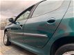 Peugeot 206 - 1.4 Gentry / nwe apk / airco / pano dak / 5deurs - 1 - Thumbnail
