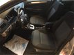 Opel Astra Wagon - 1.8 Business met Navigatie - 1 - Thumbnail