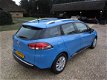 Renault Clio Estate - 1.2-16V Collection Navi, cruise, airco, parkeerhulp - 1 - Thumbnail