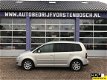 Volkswagen Touran - 2.0 TDI Highline * LEDER * NAVIGATIE * AUTOMAAT - 1 - Thumbnail