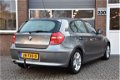 BMW 1-serie - 118d AUT 5-DRS ECC-AIRCO/CRUISE/NAVI - 1 - Thumbnail