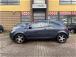 Opel Corsa - 1.0-12V '111' Edition |Nette auto|Airco|Lm velgen|Weinig KM| - 1 - Thumbnail