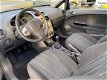 Opel Corsa - 1.4-16V Enjoy |NAP|Airco|LM Velgen| - 1 - Thumbnail