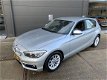 BMW 1-serie - 118i EDE Urban Automaat, Facelift, Navi, Nederlandse auto - 1 - Thumbnail